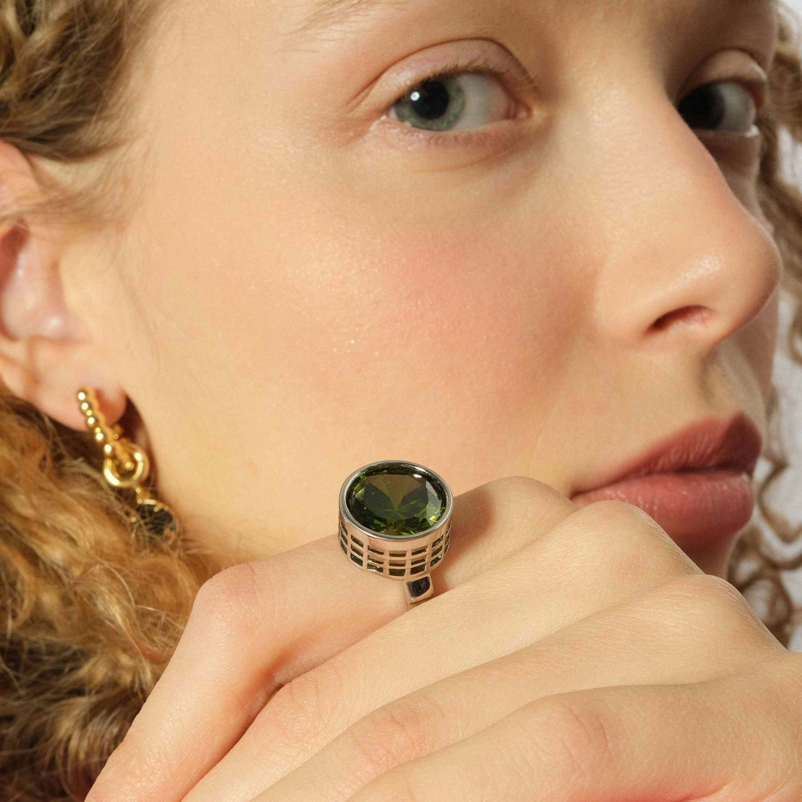 Silver ring with green stone
