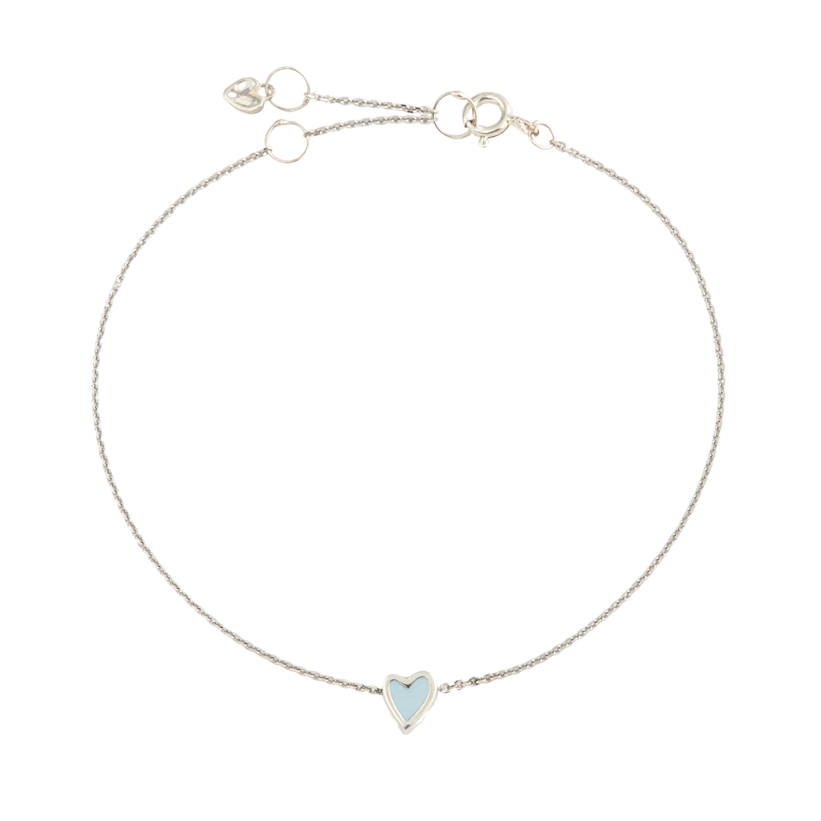 Silver bracelet with a blue heart