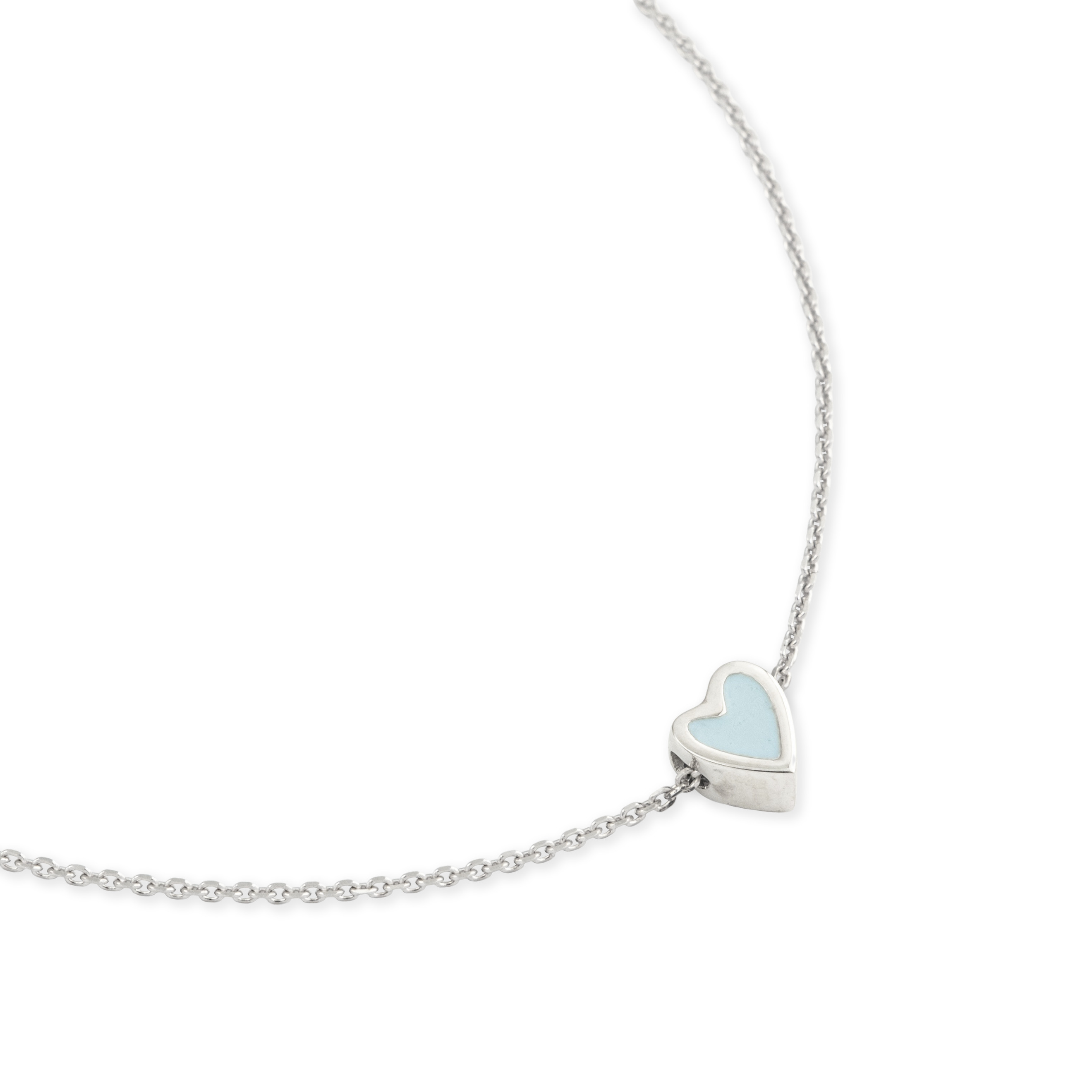 Silver bracelet with a blue heart
