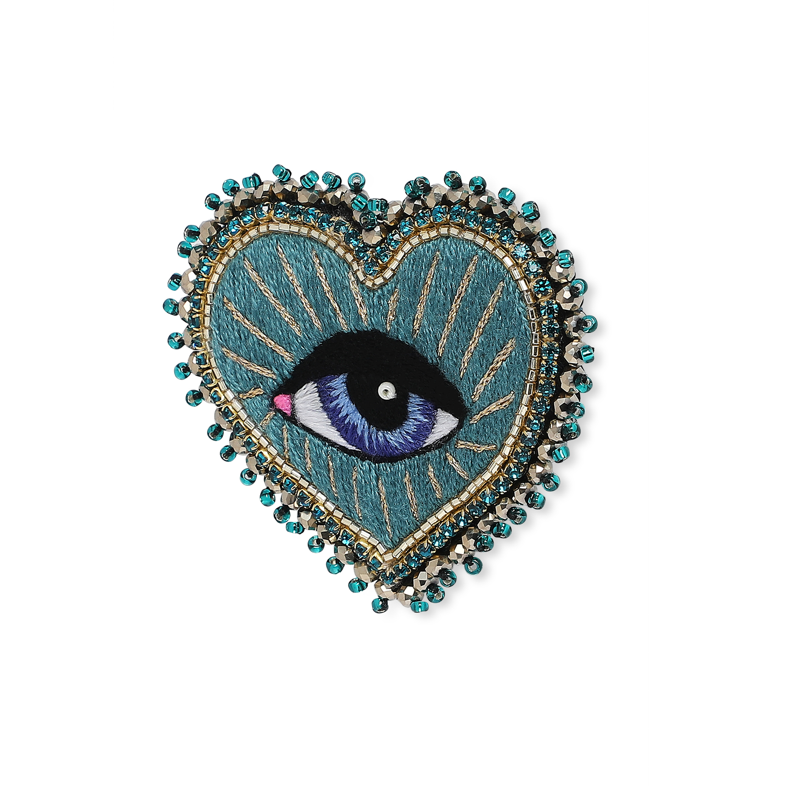 Heart brooch with an eye on a green background