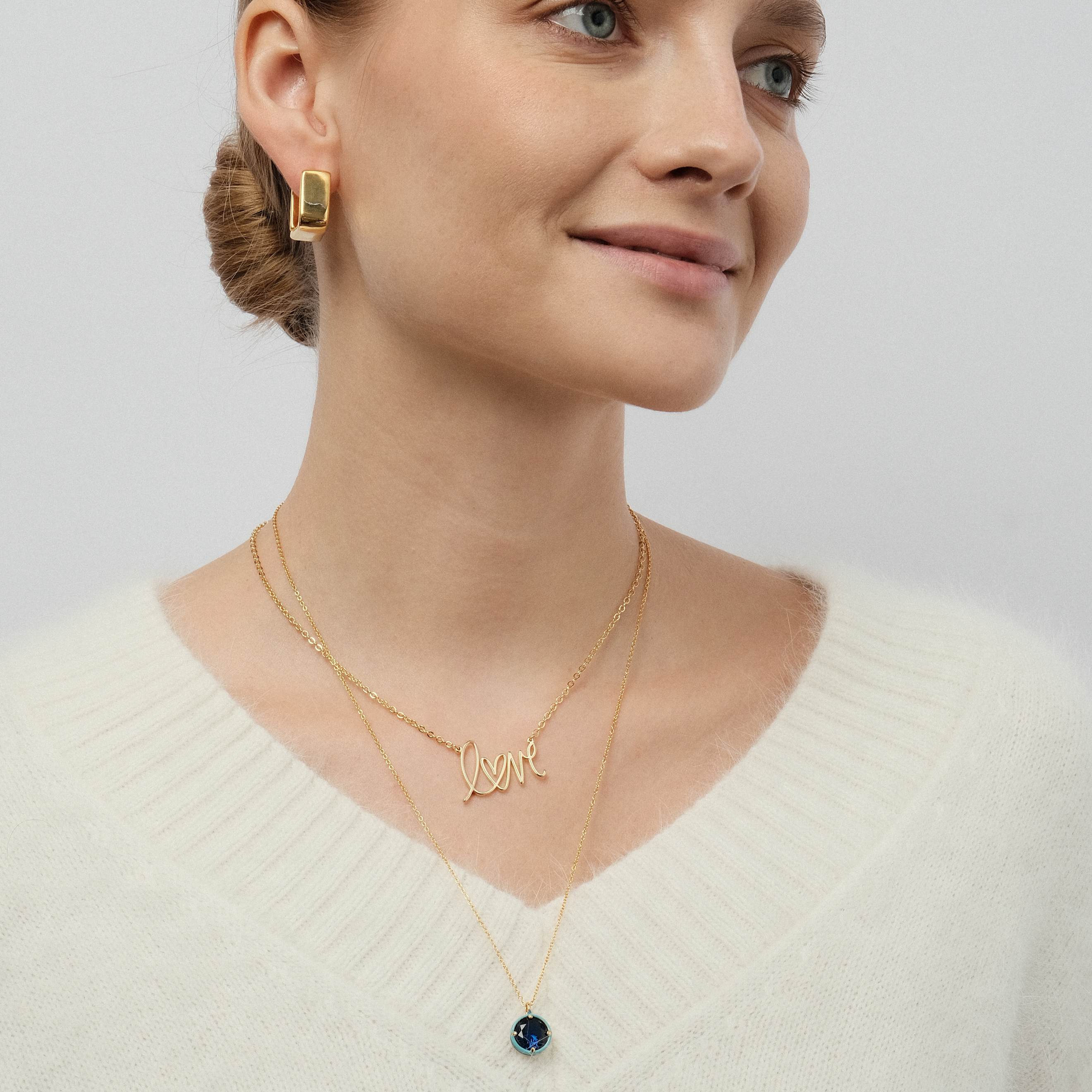 chain with a round crystal pendant