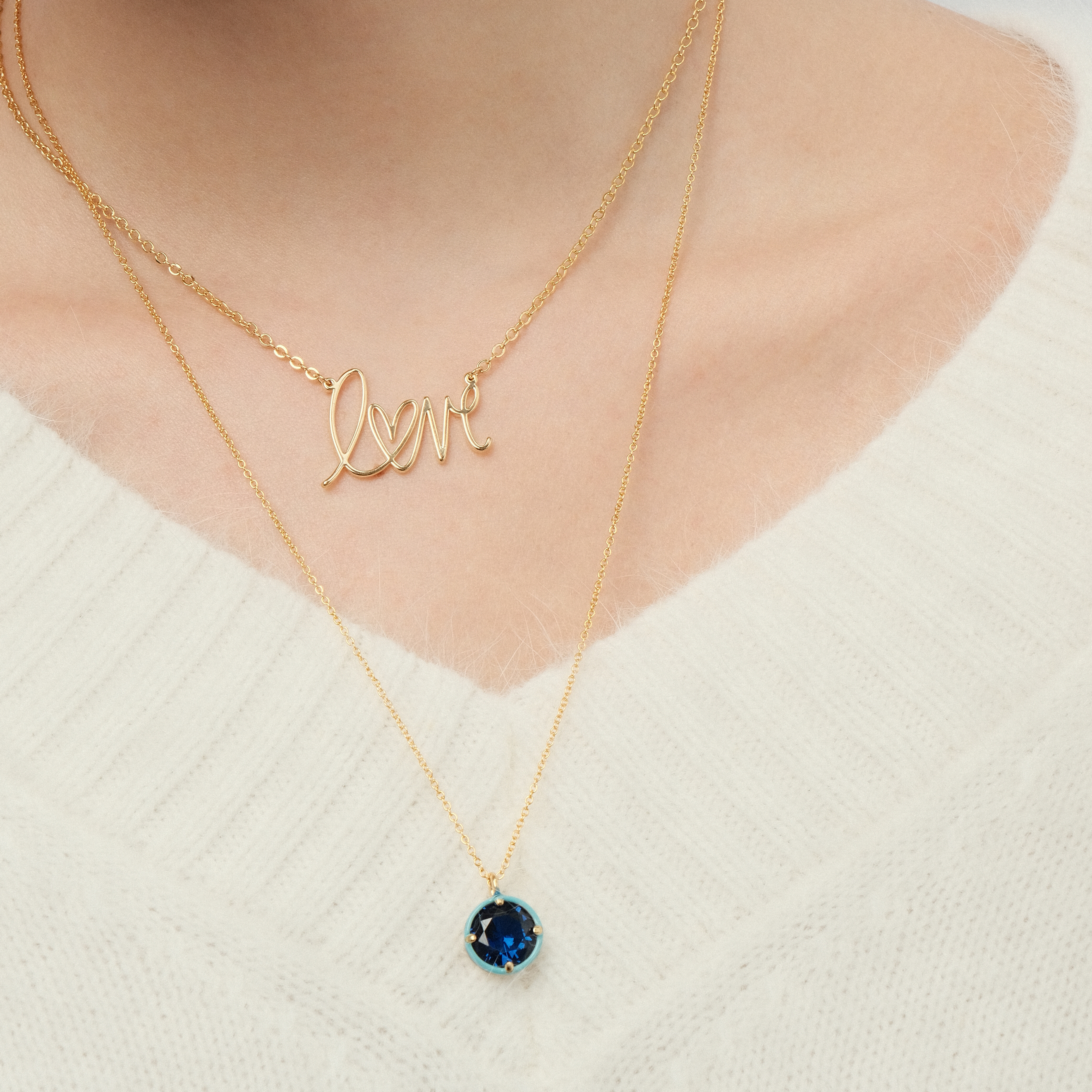 chain with a round crystal pendant