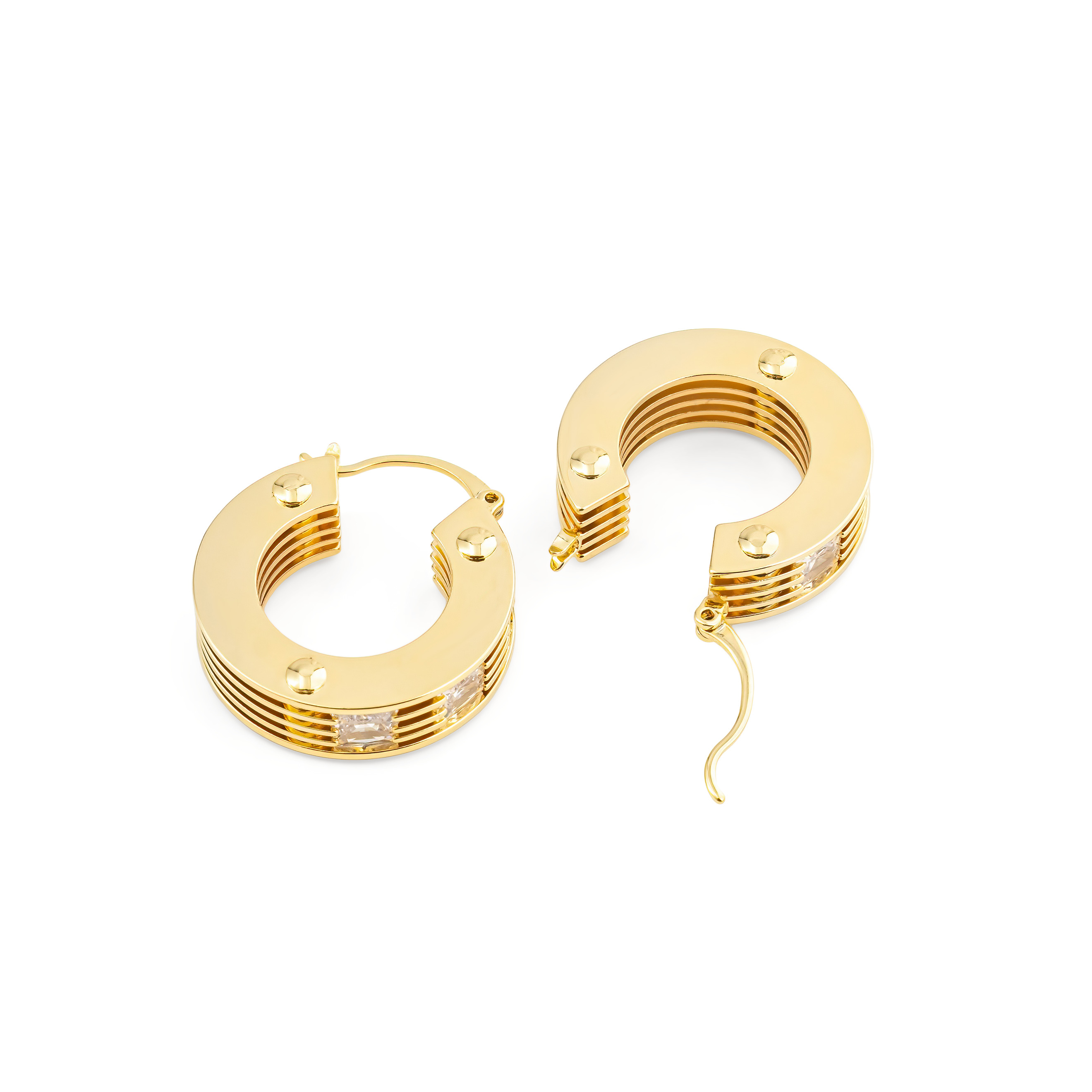 Golden round earrings made of several plates with crystals