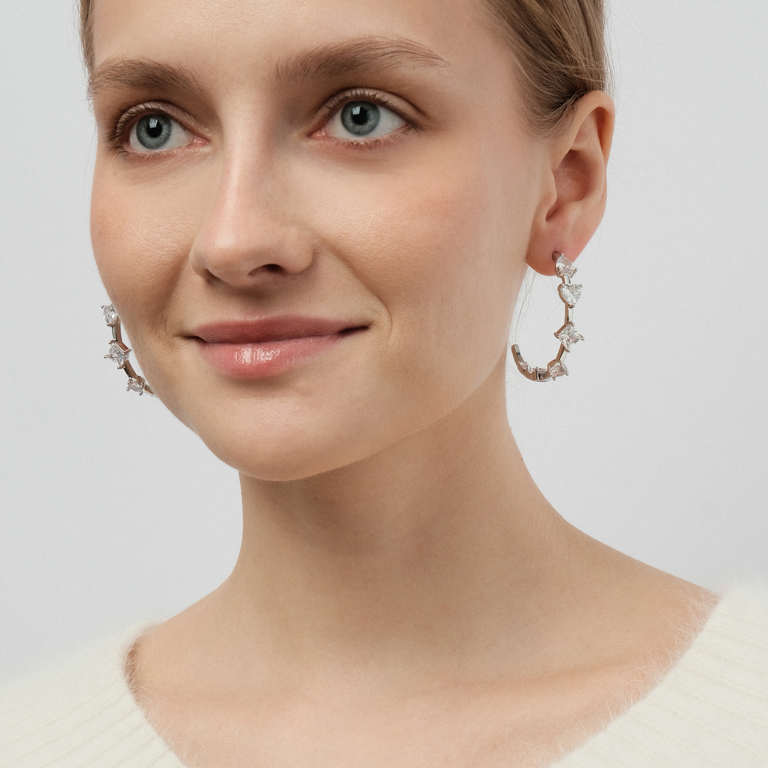earrings with heart-shaped crystals and stars