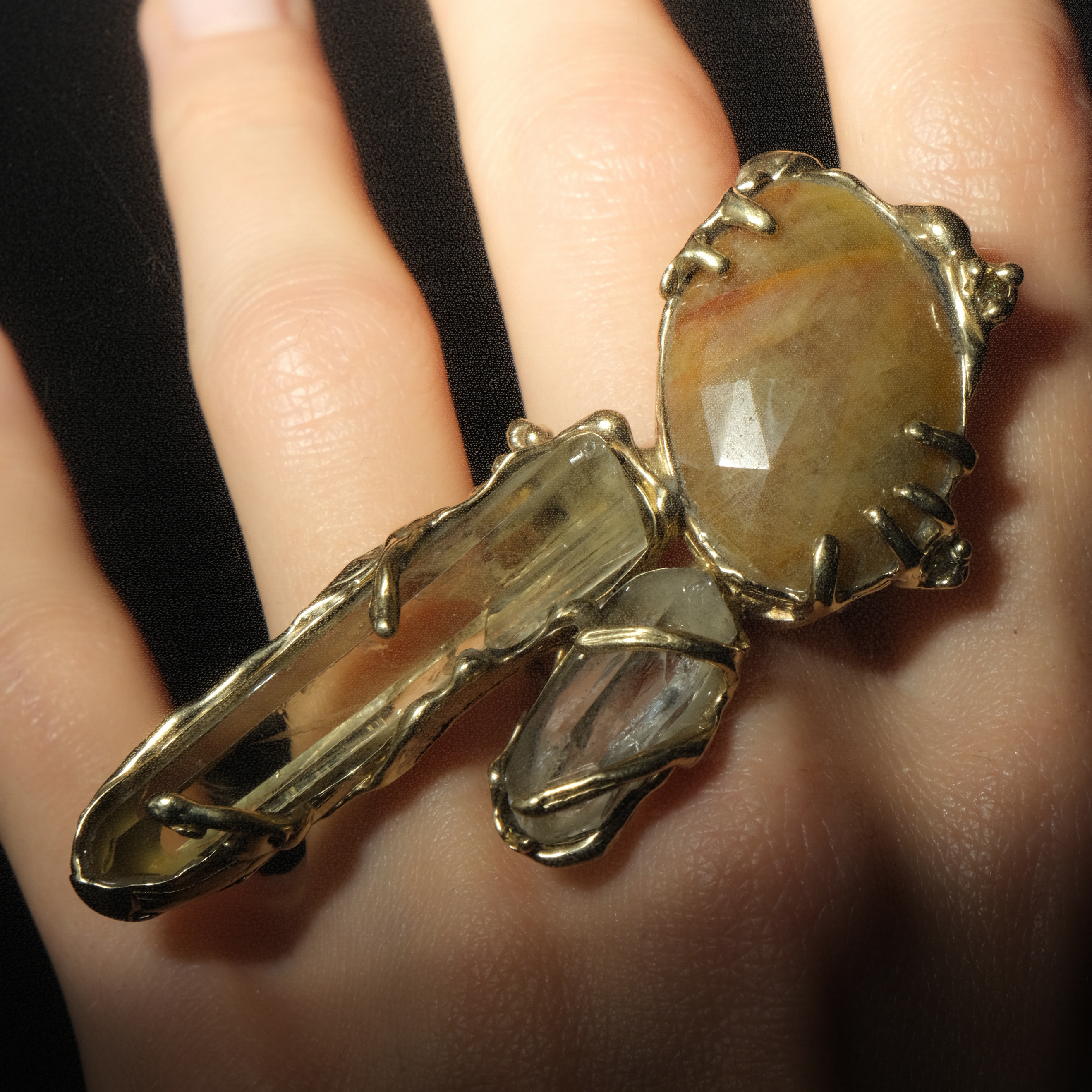 Brass ring with inserts: sapphire, rauchtopaz and quartz