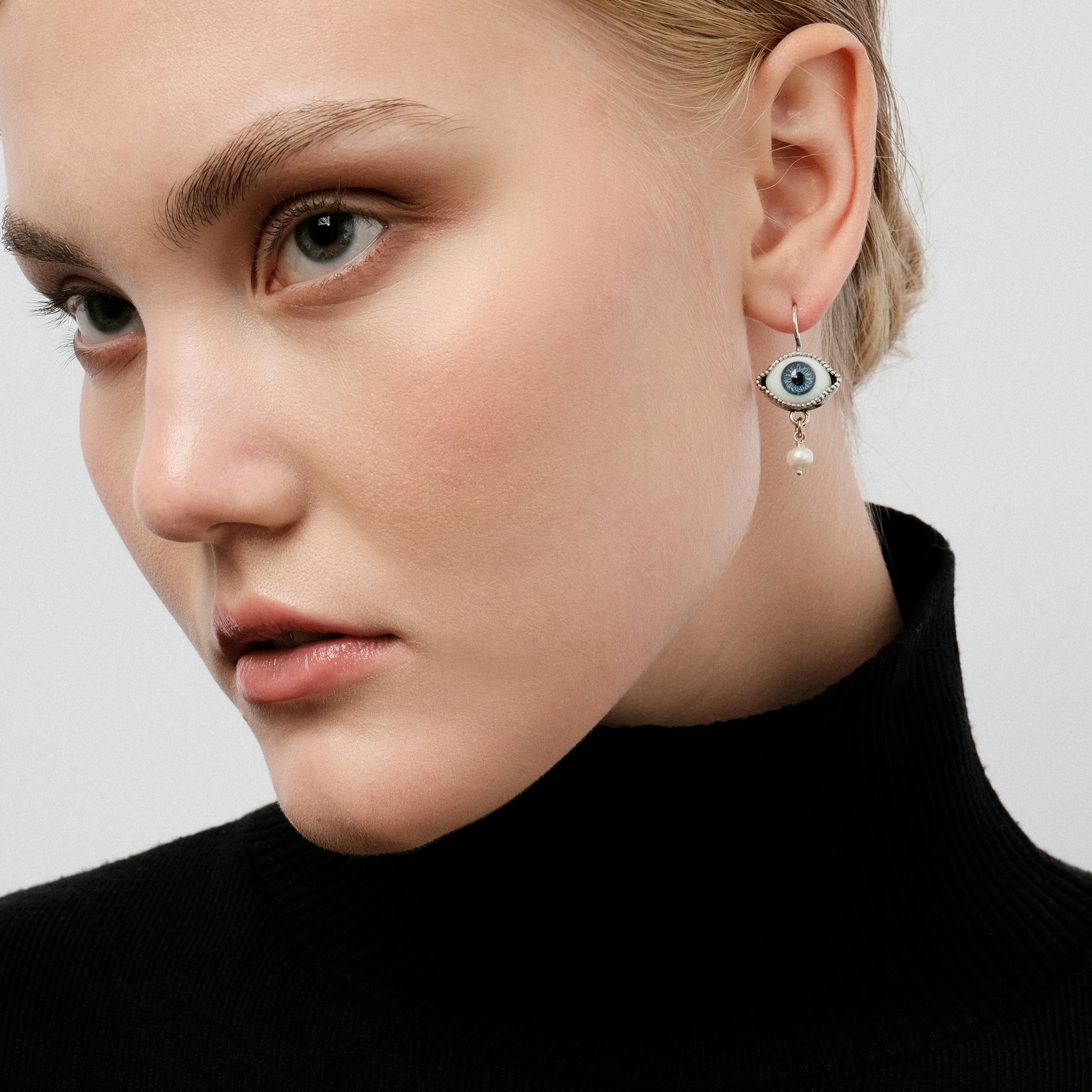 silver blue eye earrings with pearl pendants