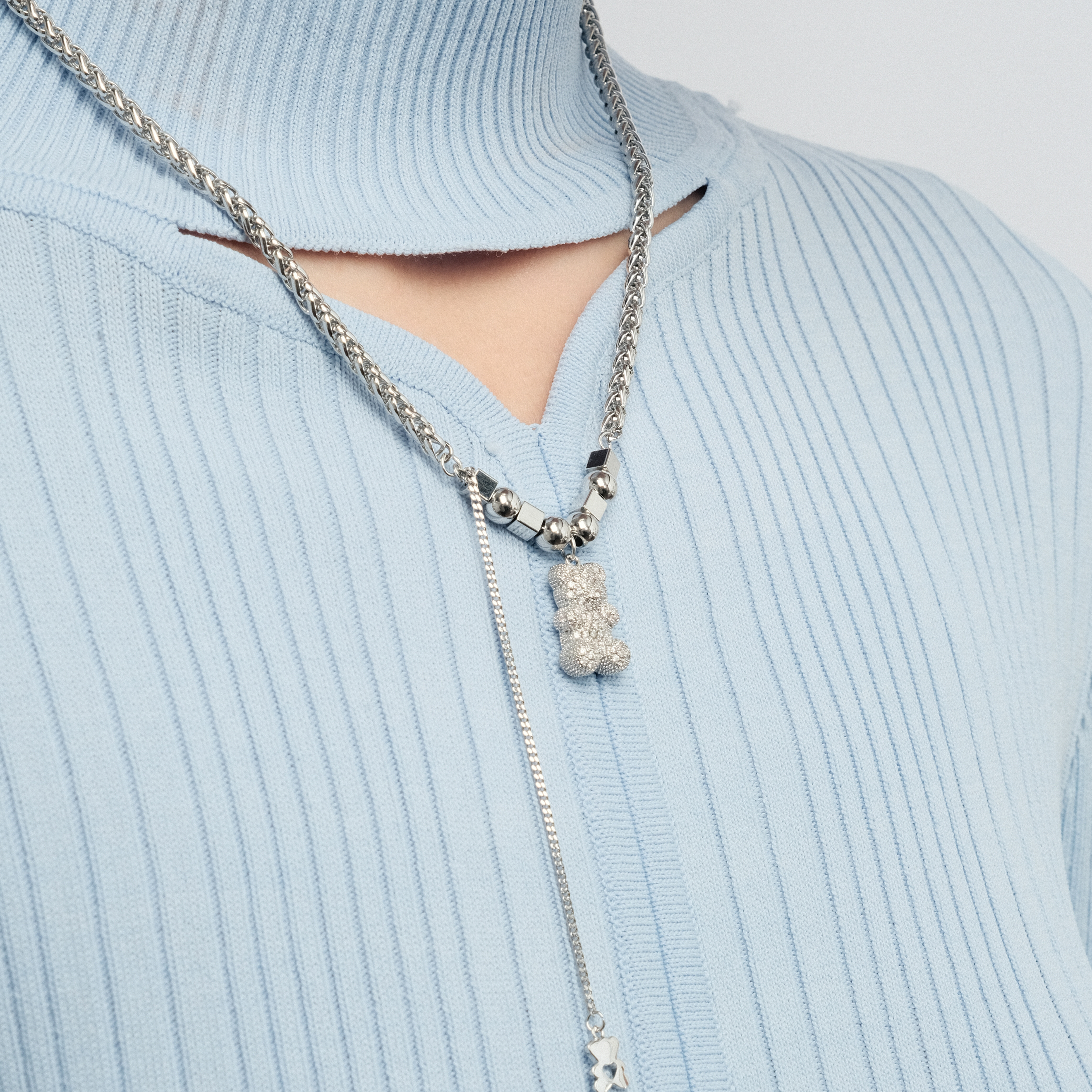 Silver pendant with a crystal teddy bear