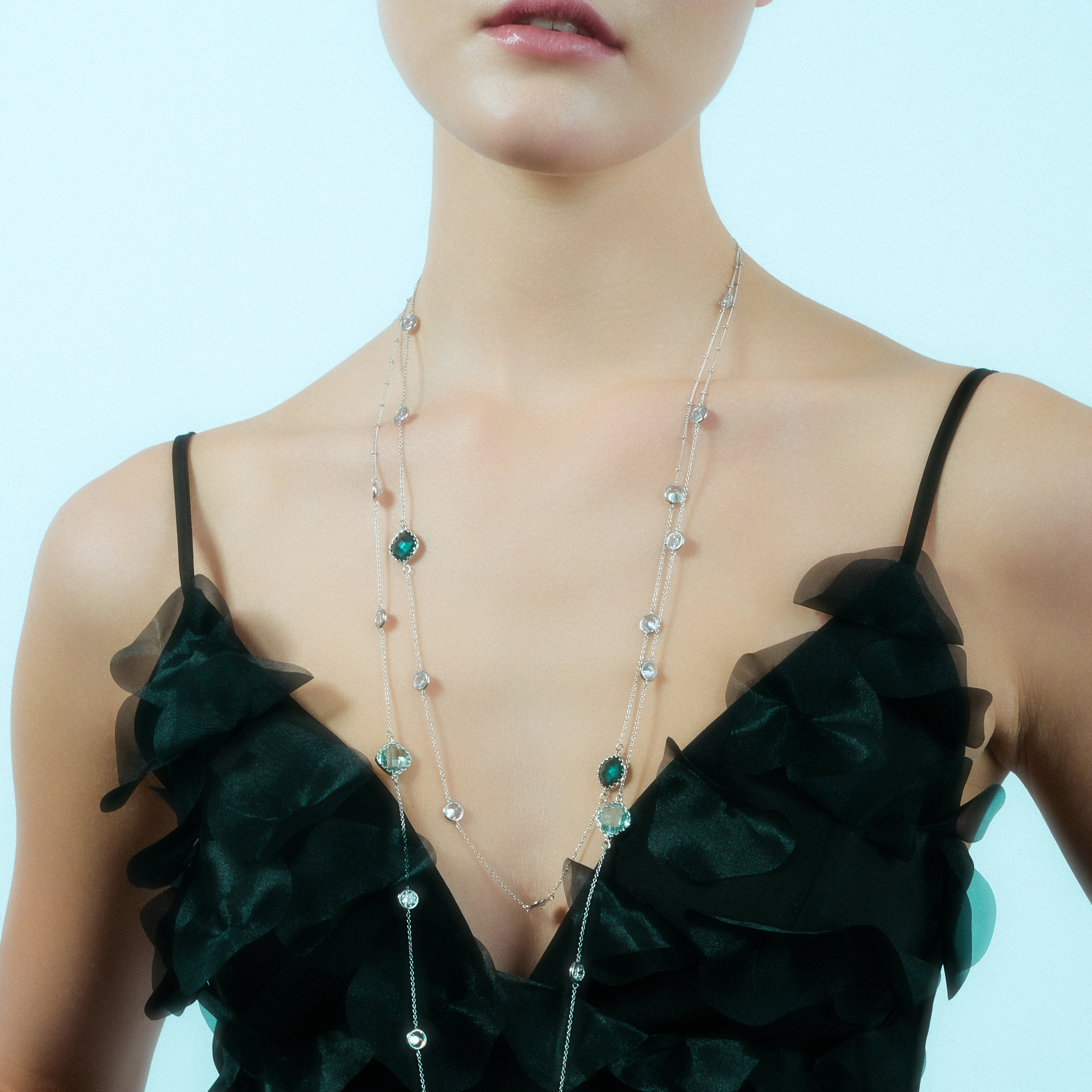 Silver necklace with blue and white stones