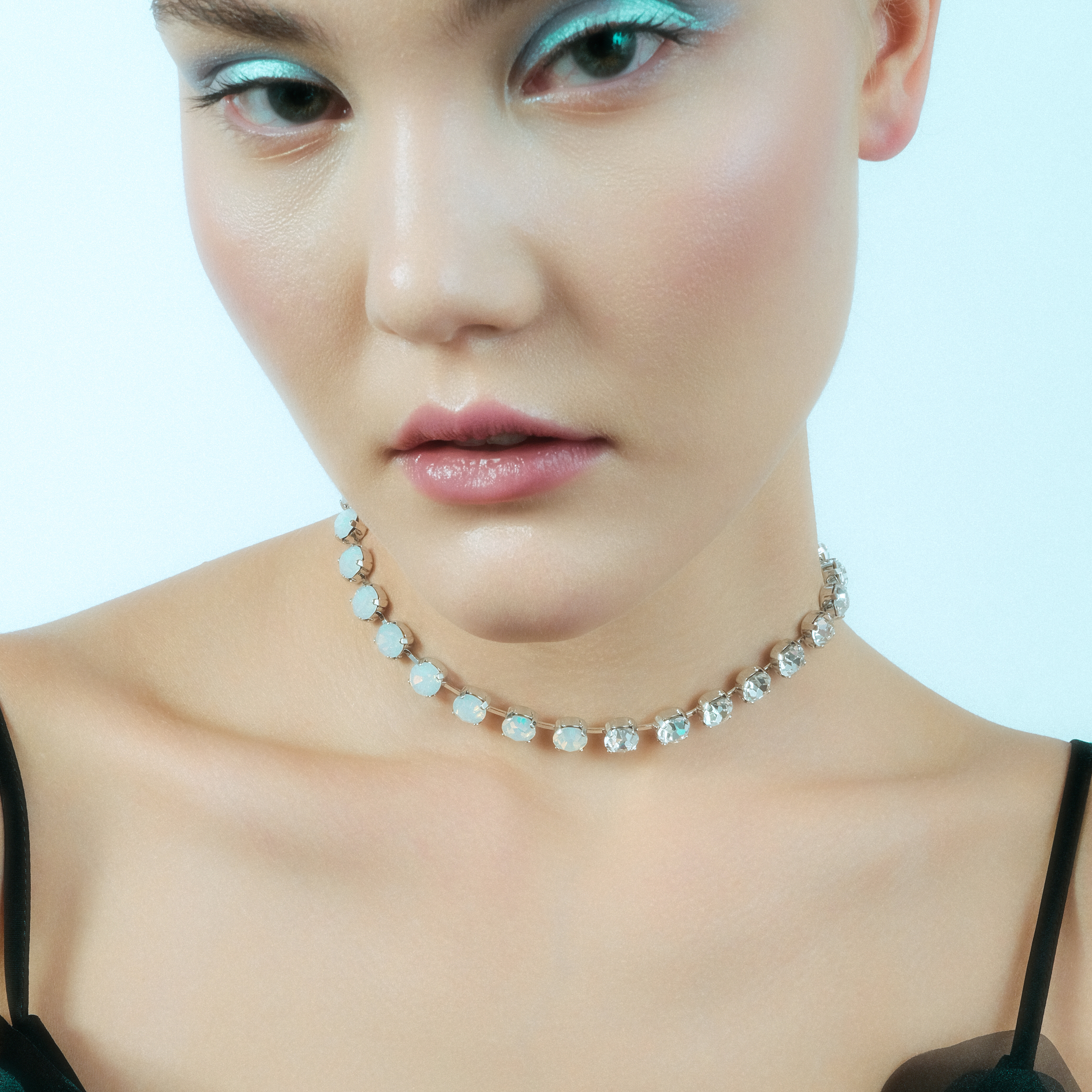 Silver-tone necklace with transparent and white stones
