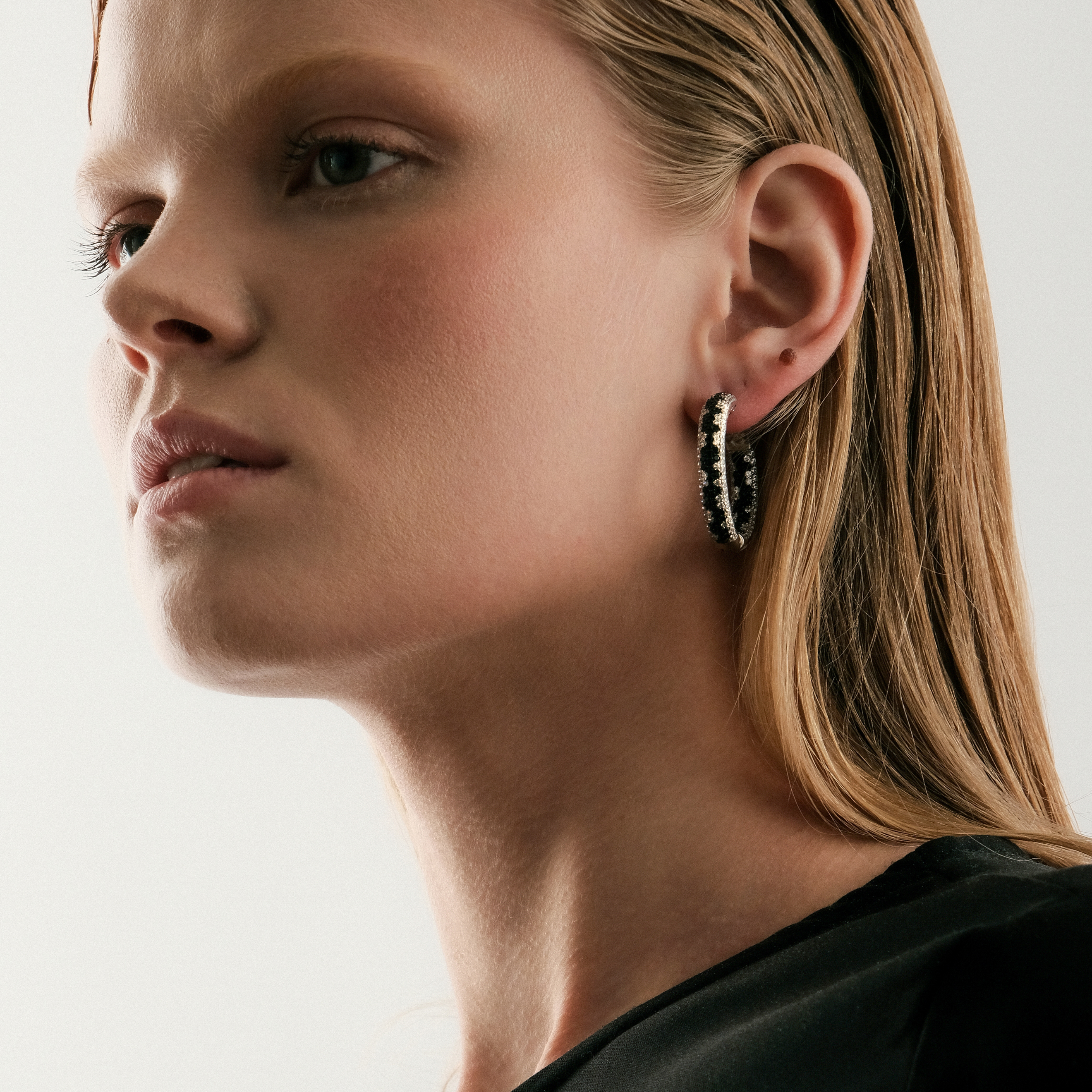 Large silver earrings with black and white crystals