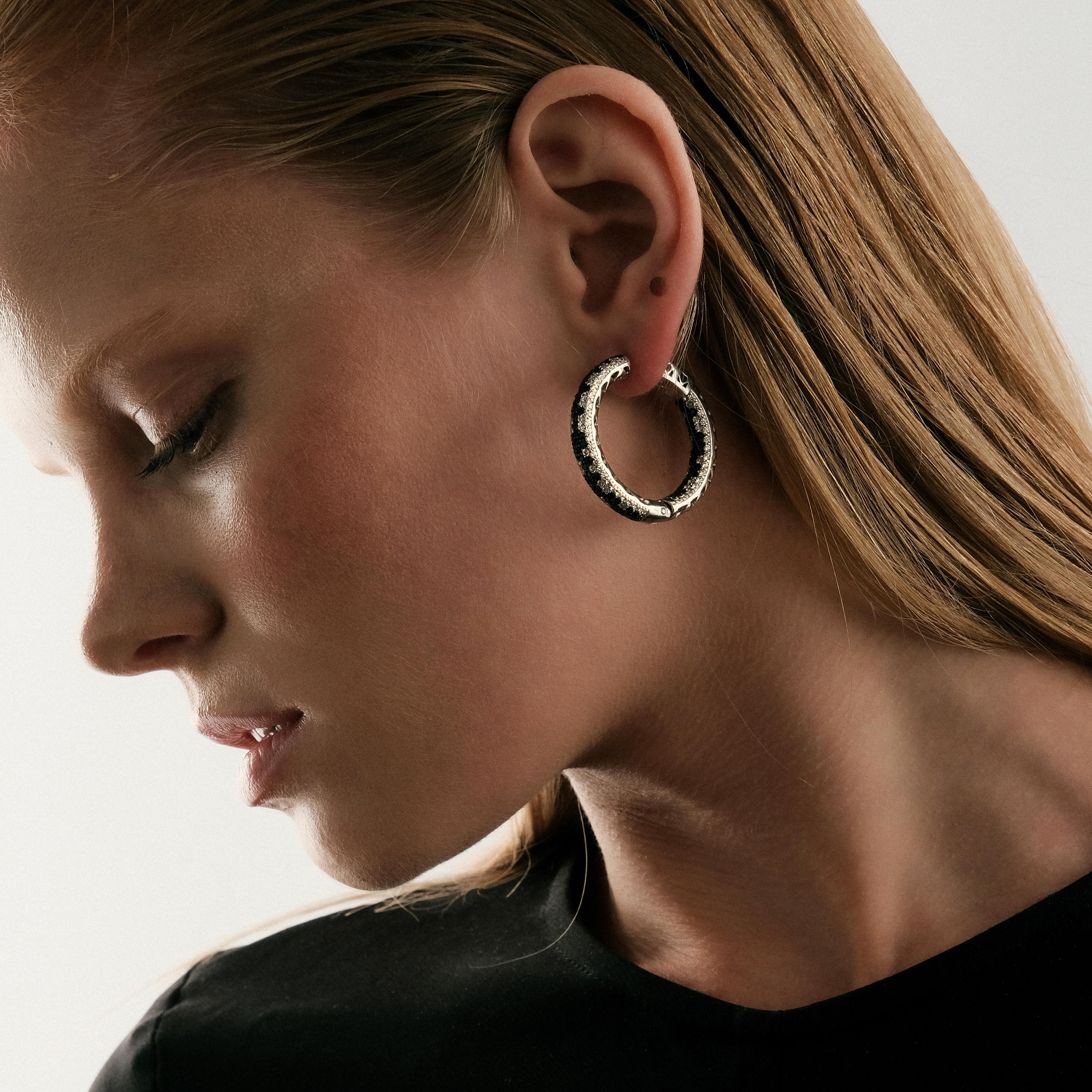 Large silver earrings with black and white crystals