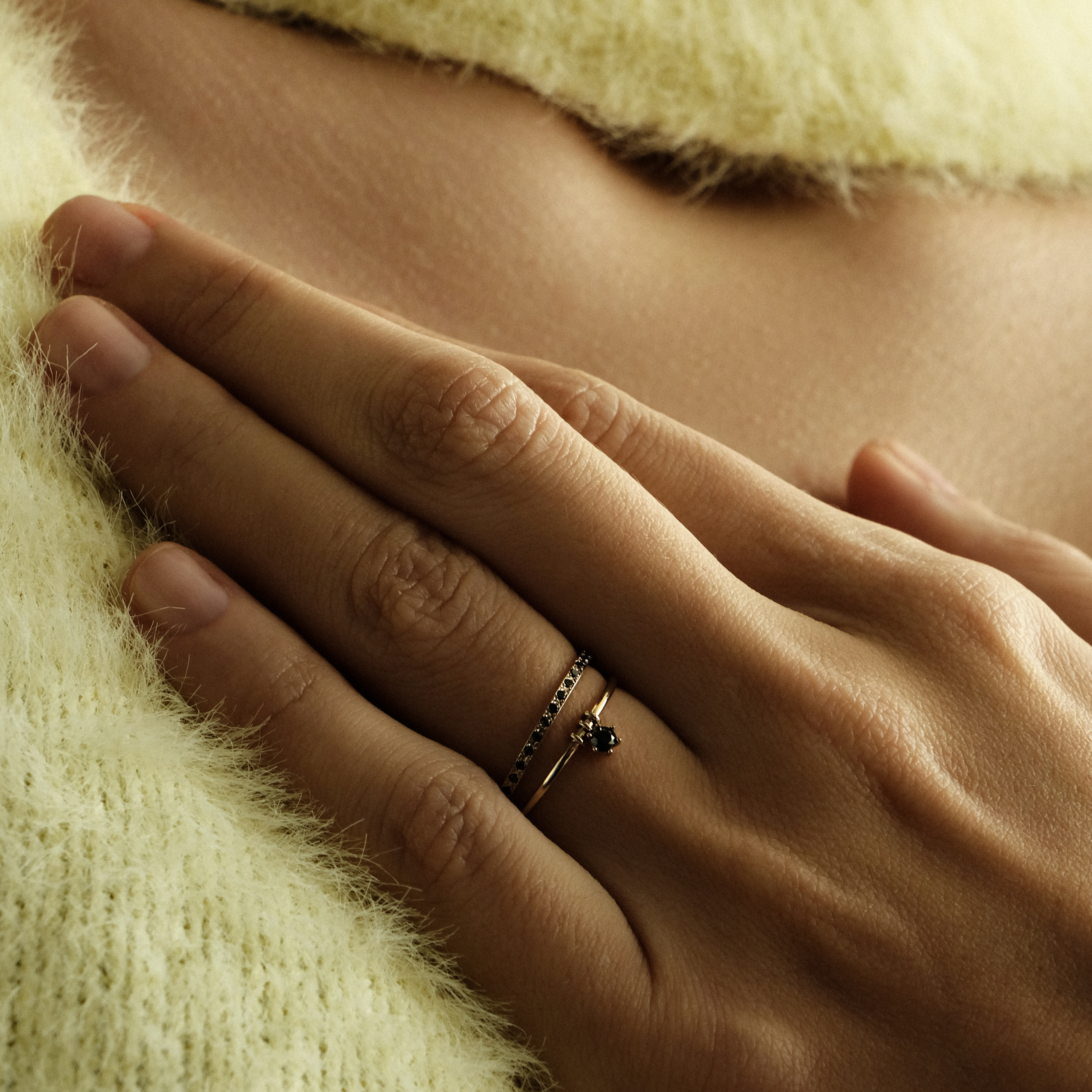 Black gold ring with movable element