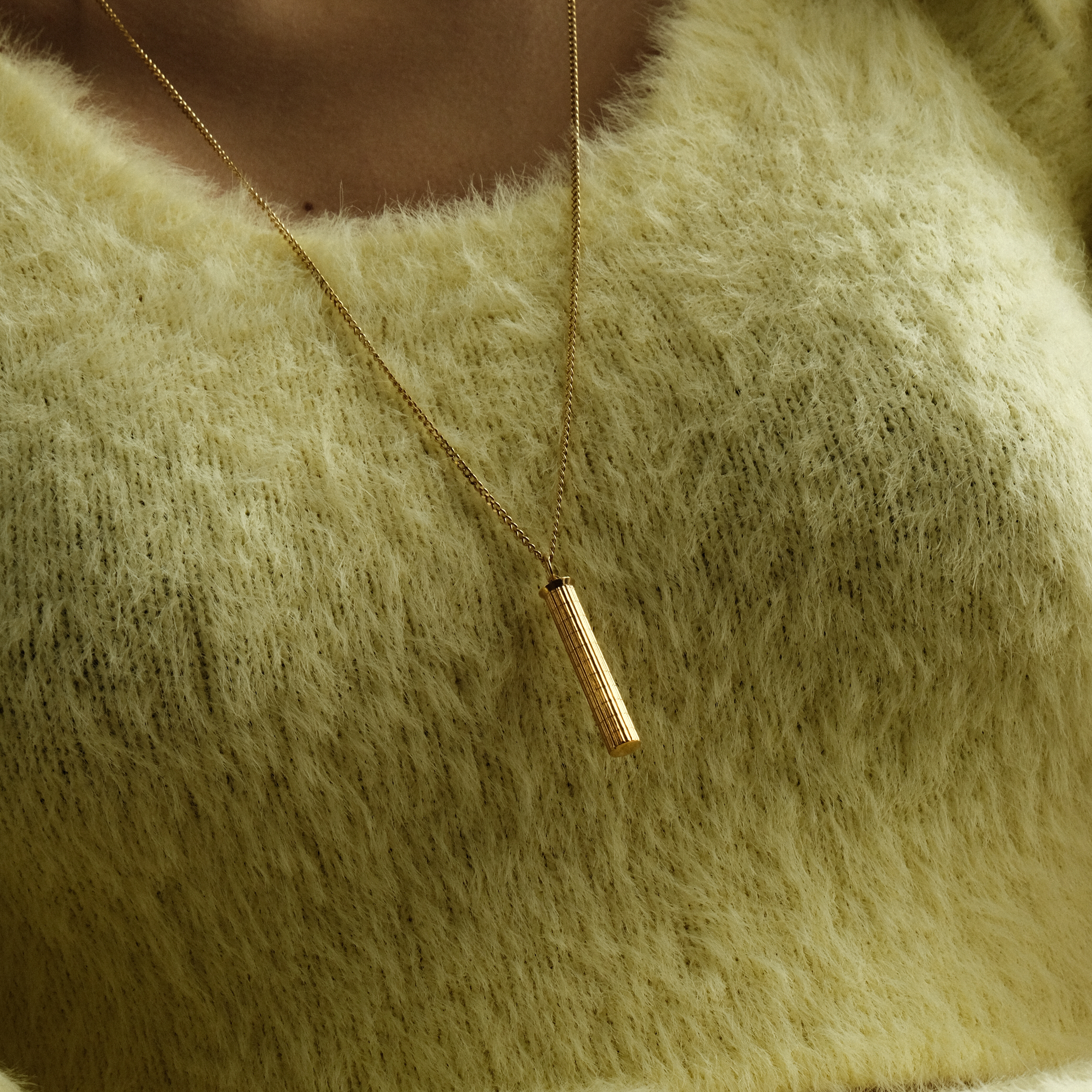 DORICOS gold-plated pendant