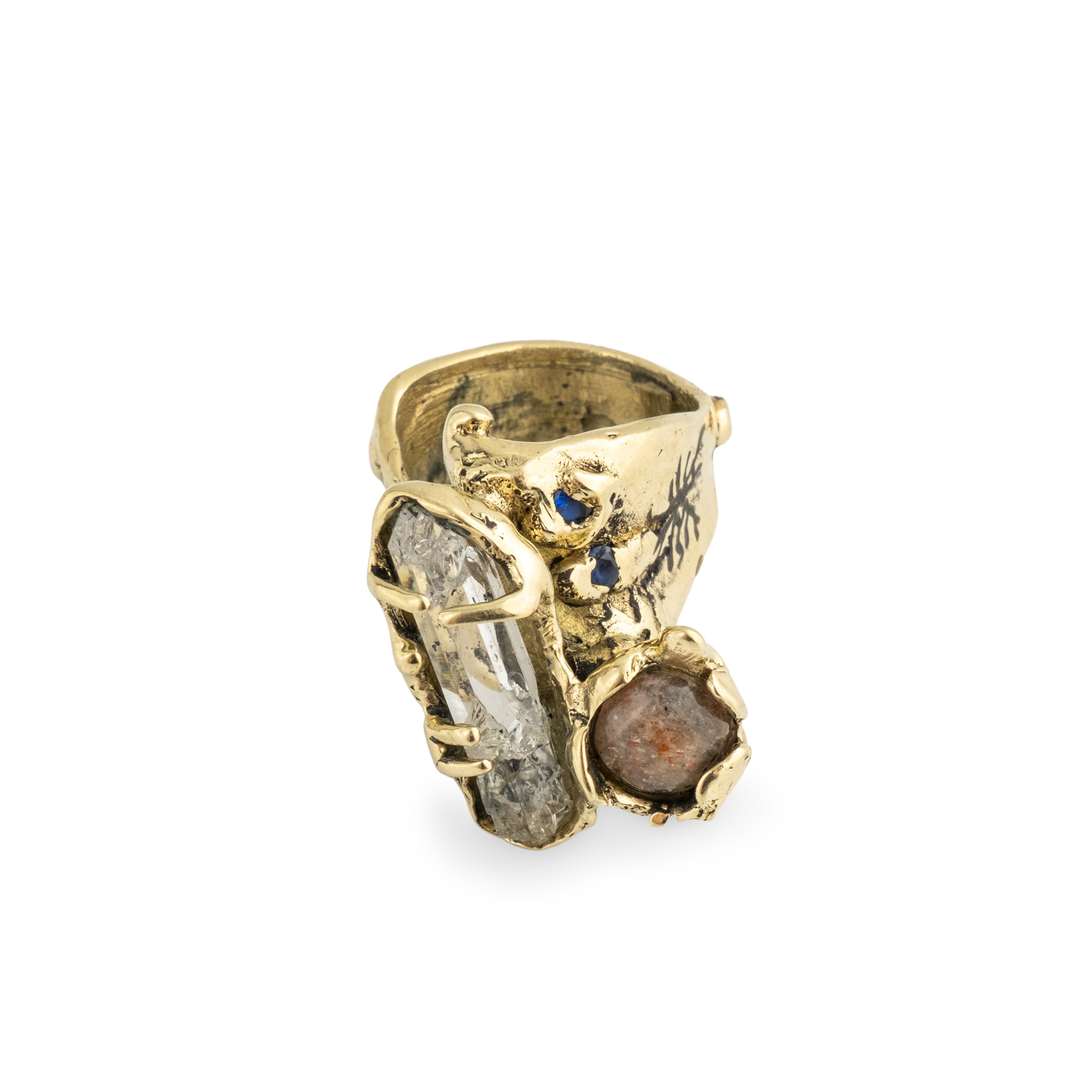 Brass ring with inserts: sunstone, quartz and two cubic zirconia