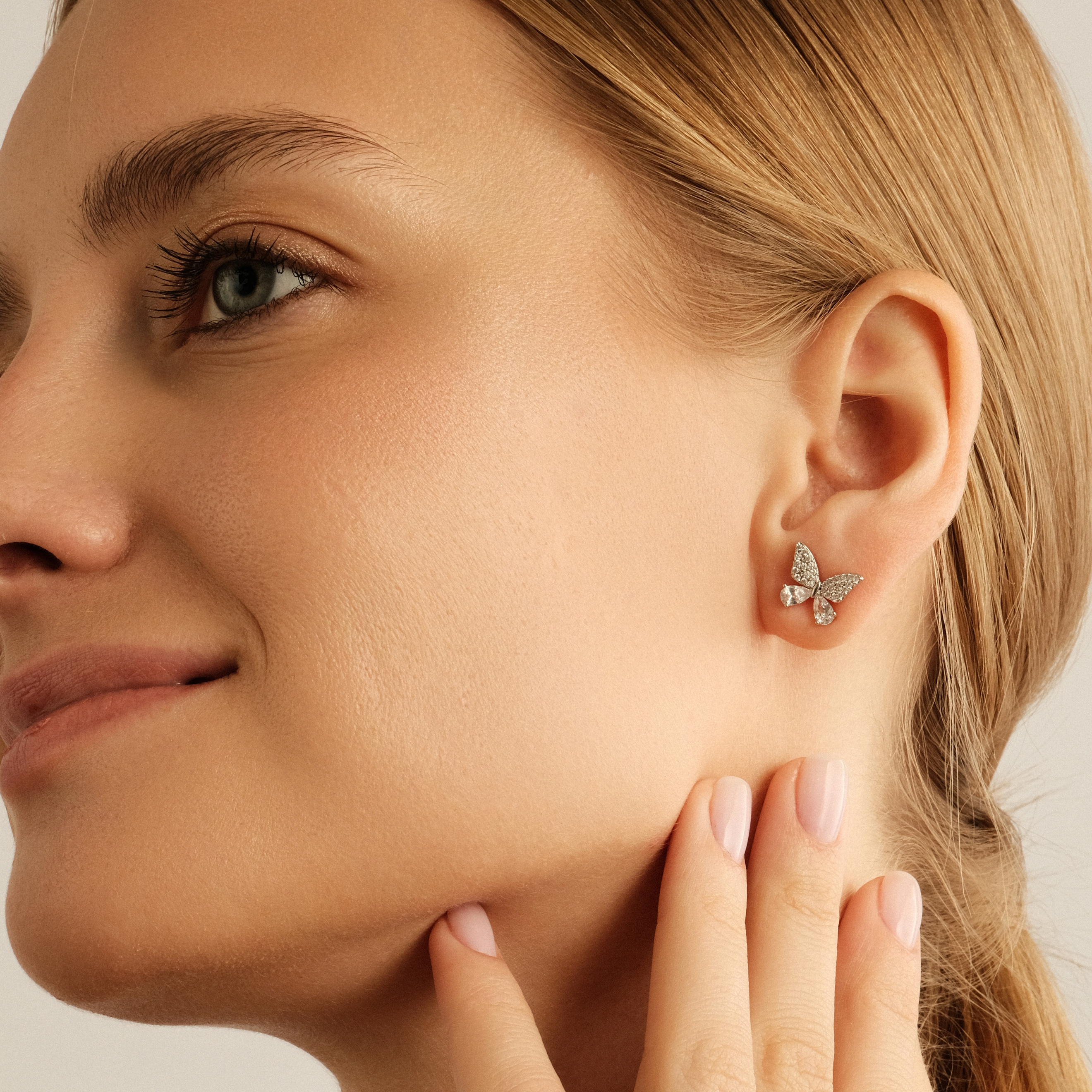 Silver stud earrings with butterflies