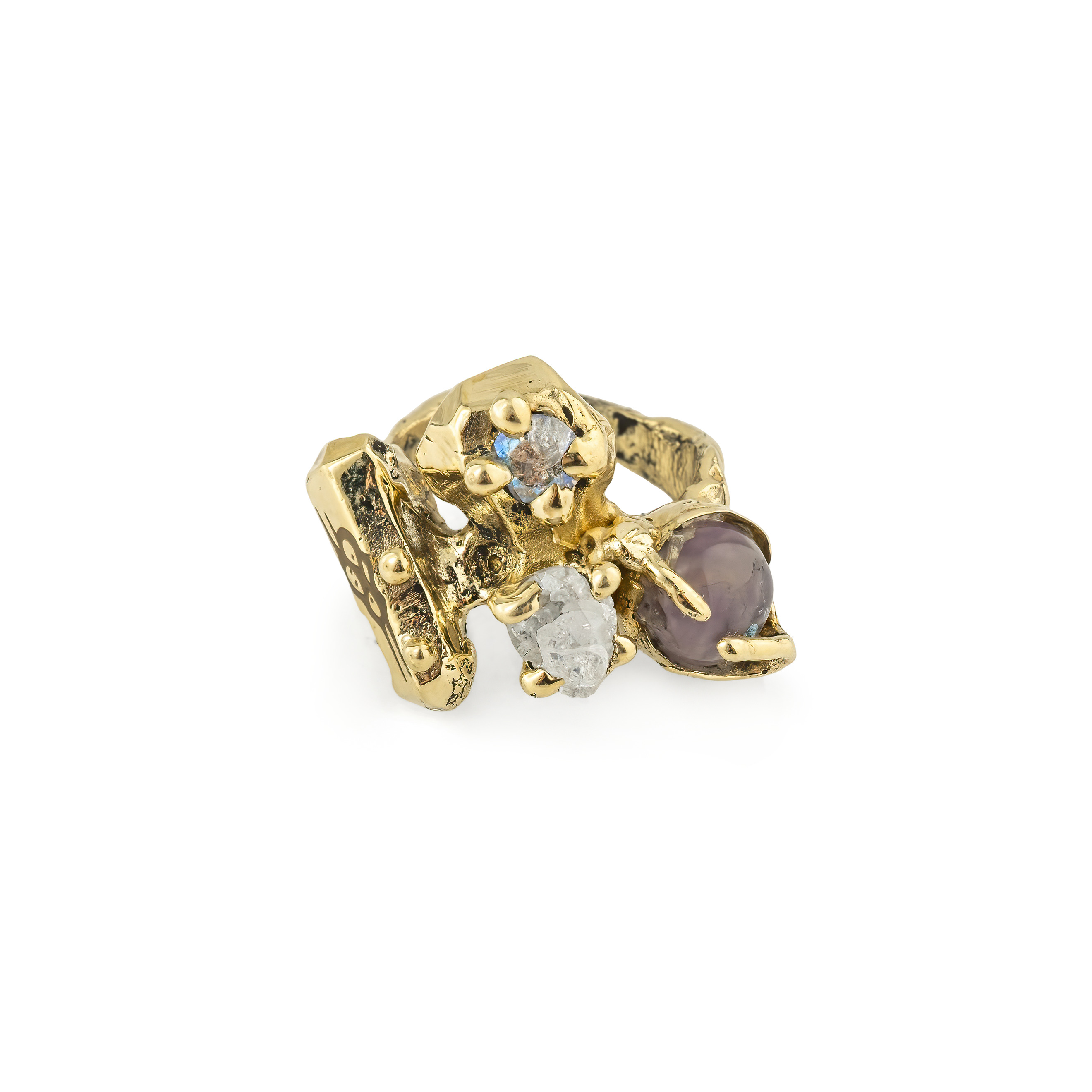 Brass ring with inserts: amethyst and two cubic zirconia
