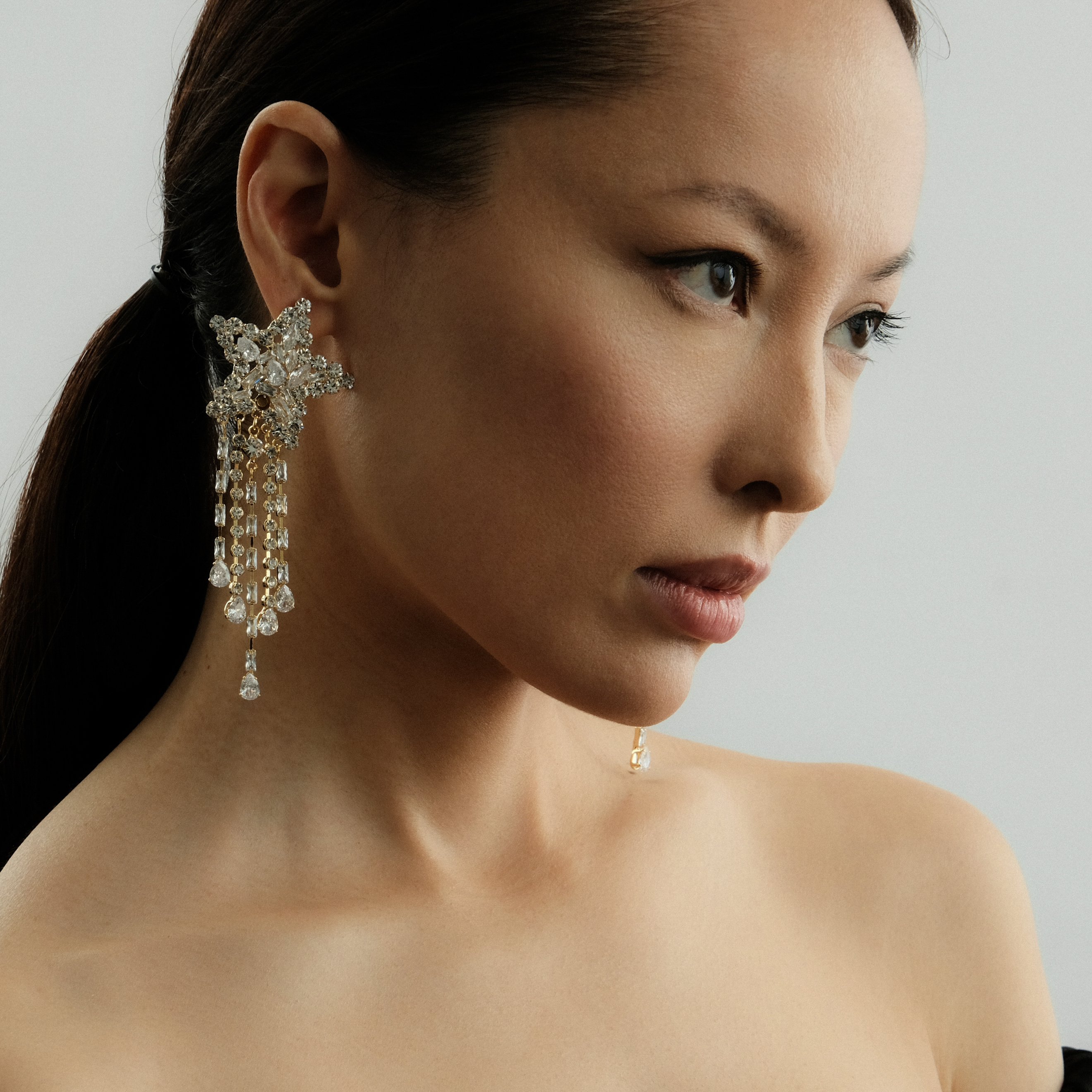 star earrings with crystals