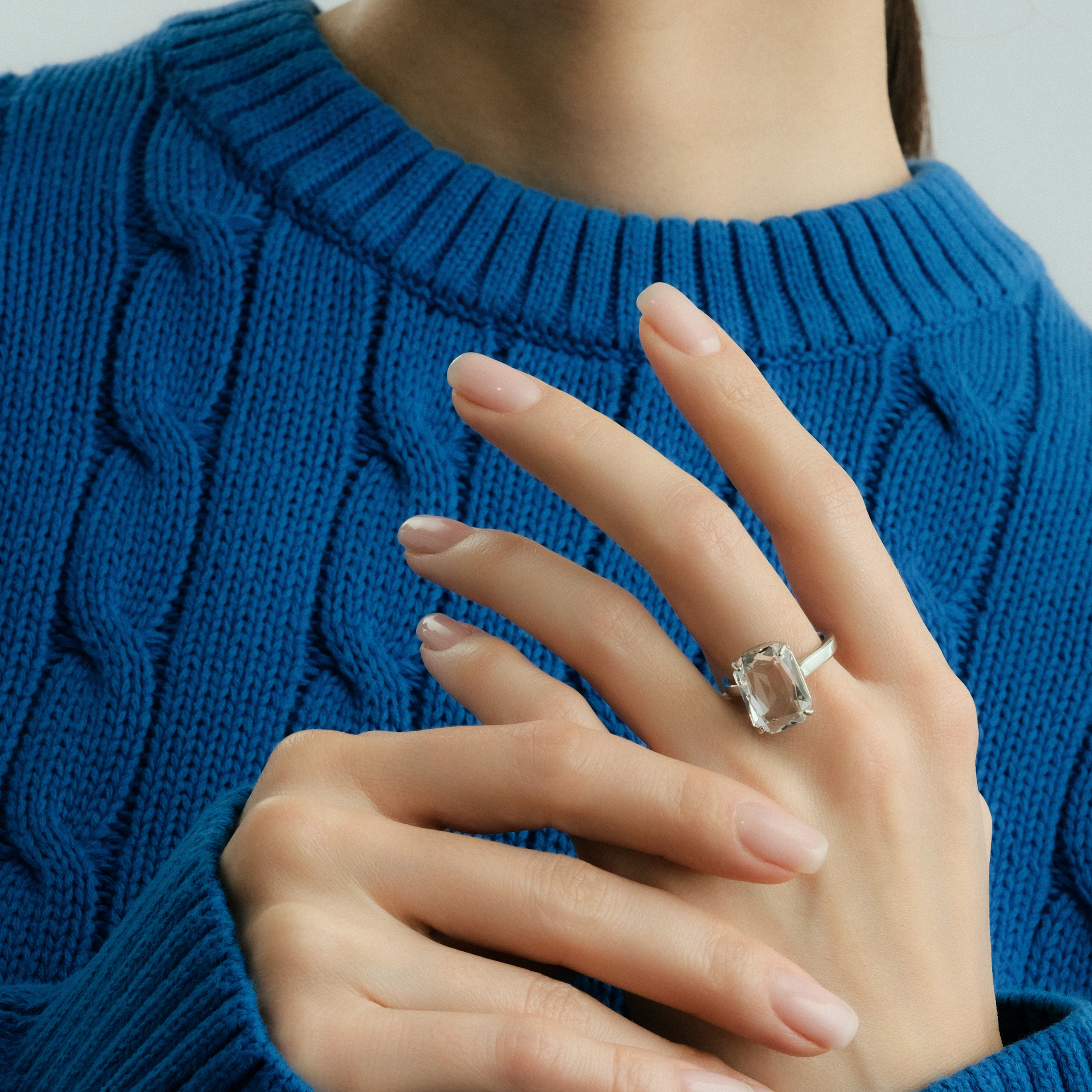 Silver ring with white stone