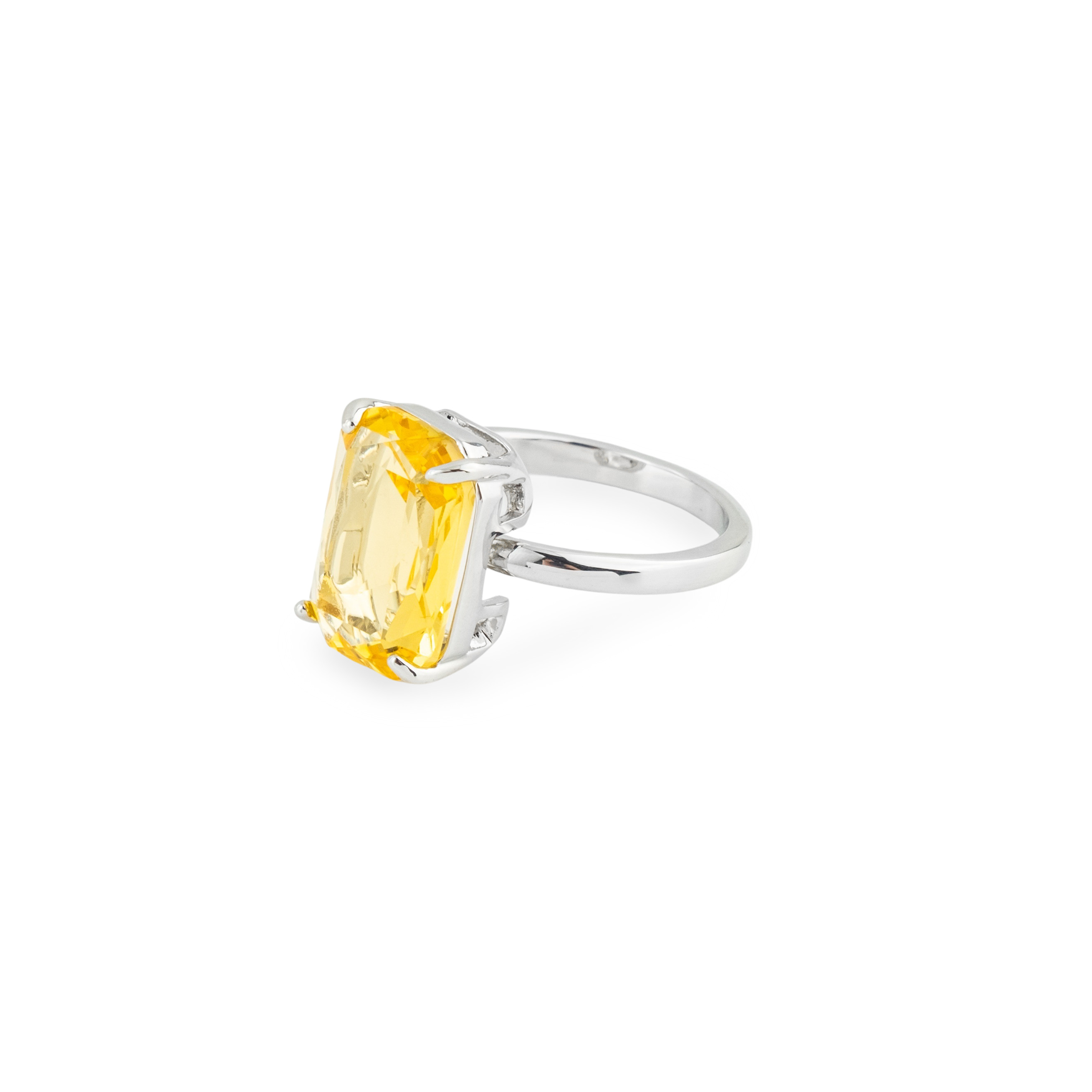Silver ring with yellow stone