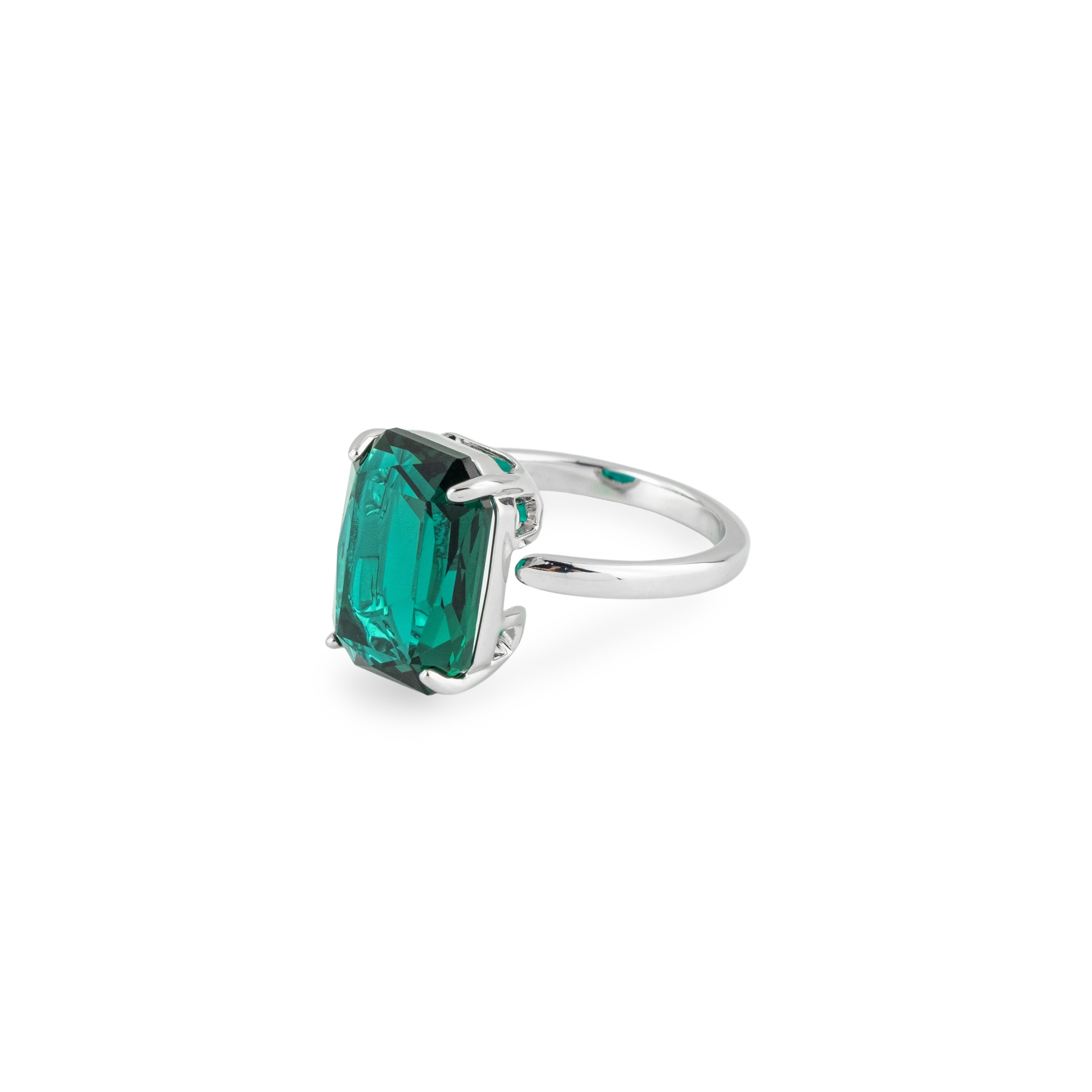 Silver ring with green crystal