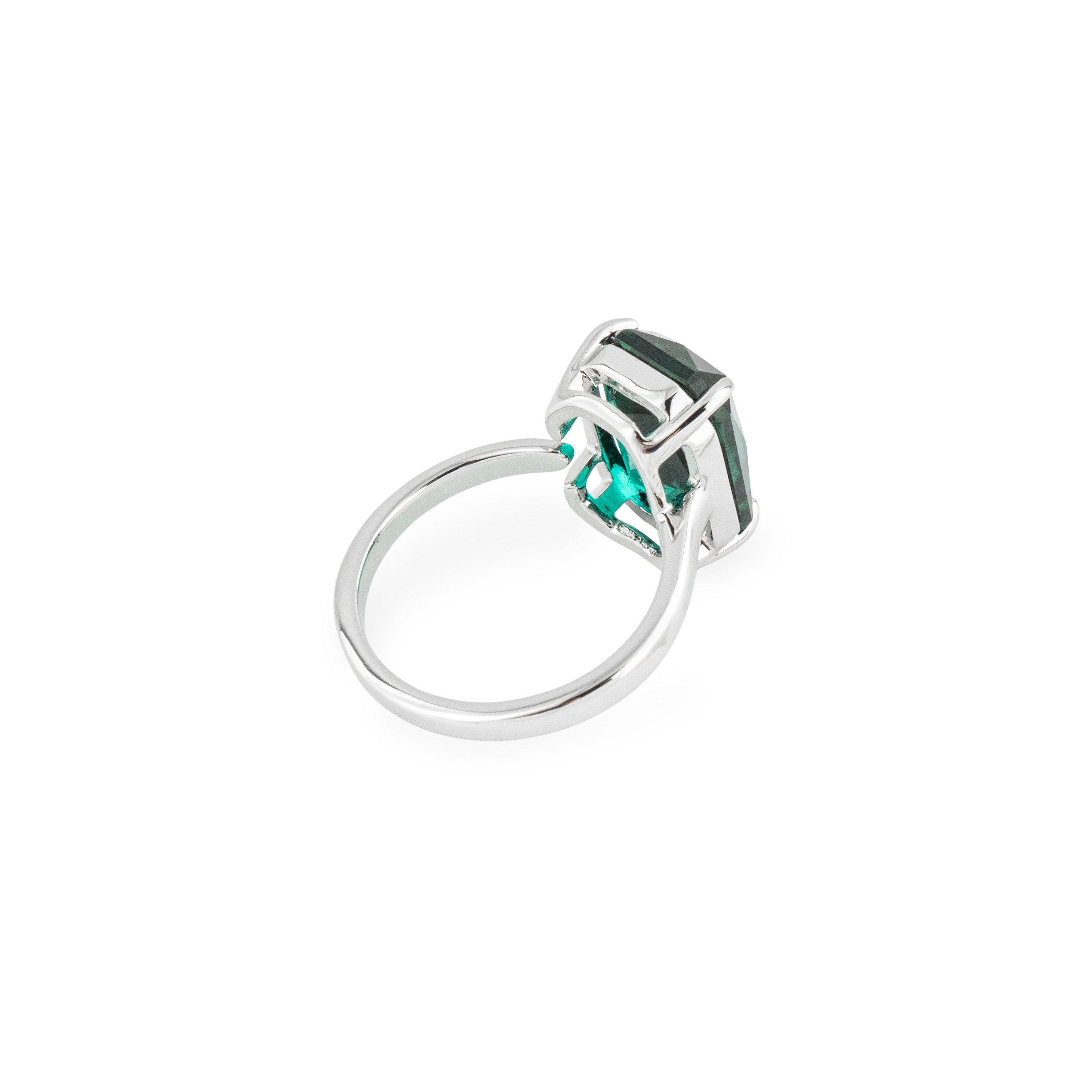 Silver ring with green crystal